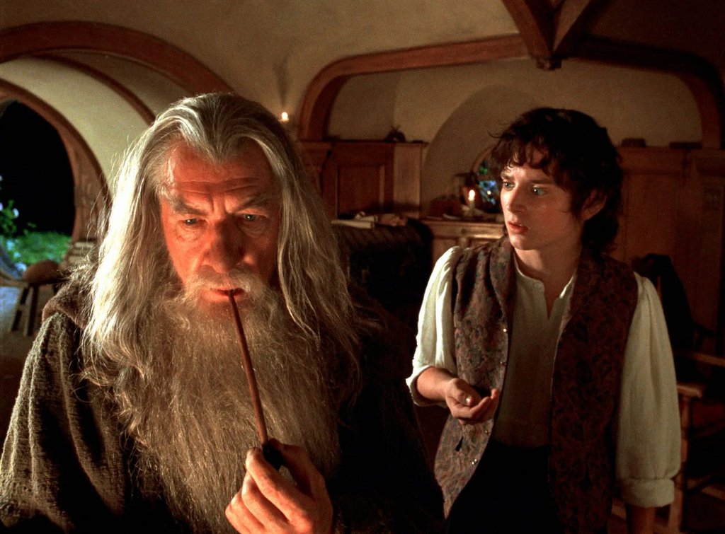Gandalf conversando com Frodo Baggins